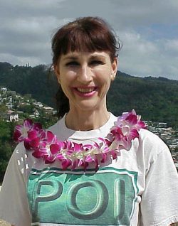 We discovered that we could purchase vanda orchid leis very inexpensively on Maunakea Street. So we started offering a free lei with every internet order over a certain threshold. Marjorie and the Orchid Lei