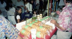 David Reed selling poi bagels at the Blaisdell Center, 1999. Note that we didn't have the yellow labels yet: these must have been "early bagels." Blaisdell Center - 1999
