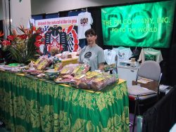 Marjorie at the booth at the Natural Products Show in Anaheim, California. We tried to sell poi itself --- and various poi goodies --- to health food stores on the mainland. On the whole they weren't interested. Marjorie at The Poi Company Booth in Anaheim, California