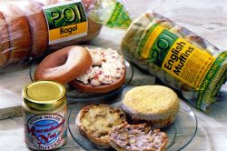 A Camera Hawaii photograph of Poi Bagels, Poi English Muffins, Macadamia Nut Butter, and Lomi Lomi Salmon Cream Cheese. Poi Company Product Promotional Shot