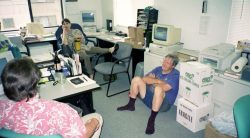 The back of David Reed's head, Marjorie Walsh, and an exhausted looking John Bushby